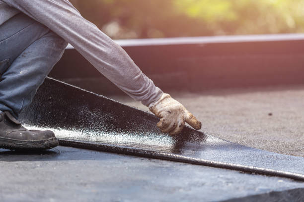 Professional Basement Waterproofing technician working in Grelton, OH